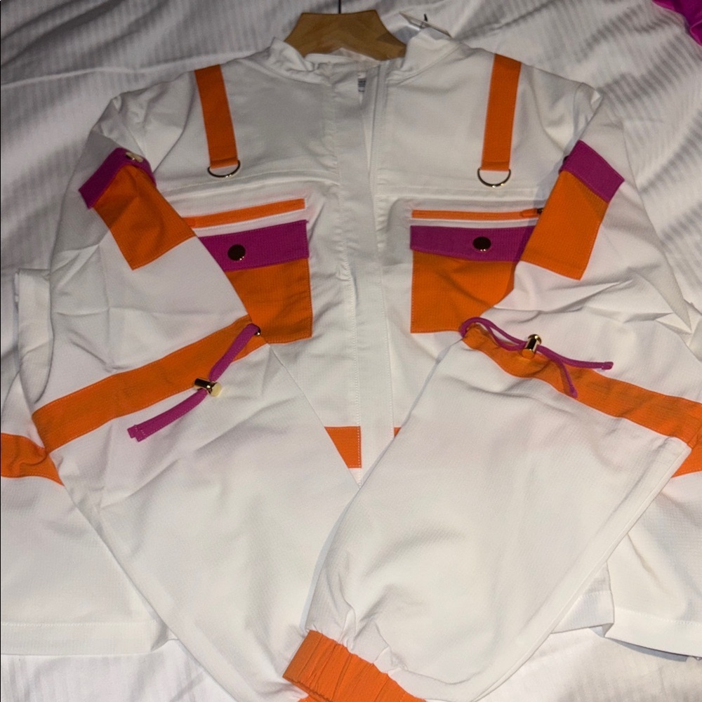 PELOTON CARGO JACKET NWTS WHITE ORANGE FUCHIA ZIP CLOSURE DRAW STRING GOLD TABS - Picture 8 of 11